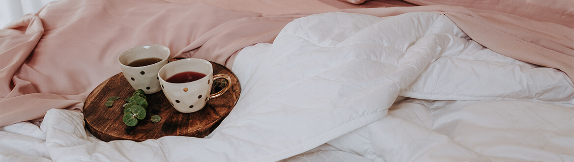 teacups on bed