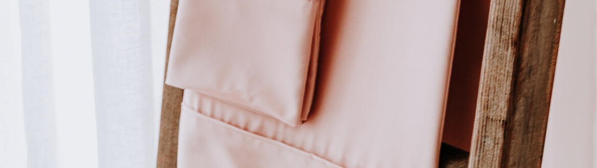 sheets hanging on chair