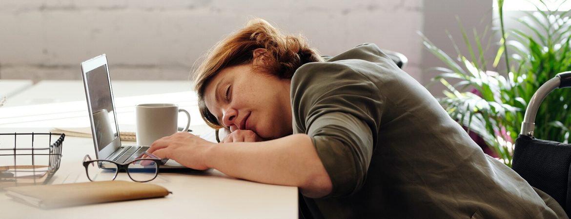 woman sleeping on the notebook